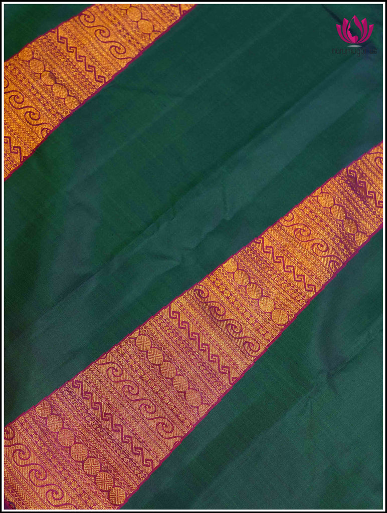 Kanchipuram silk saree in Emerald Green with a Unique zari woven temple design 7