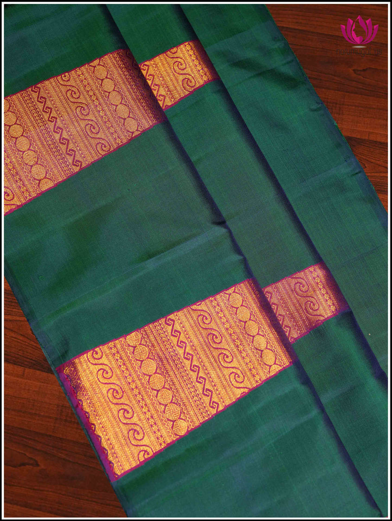 Kanchipuram silk saree in Emerald Green with a Unique zari woven temple design 3