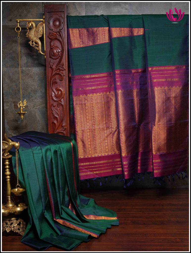 Kanchipuram silk saree in Emerald Green with a Unique zari woven temple design 11