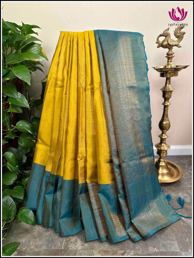 Kanjivaram soft silk in golden Mustard and greenish Blue 1