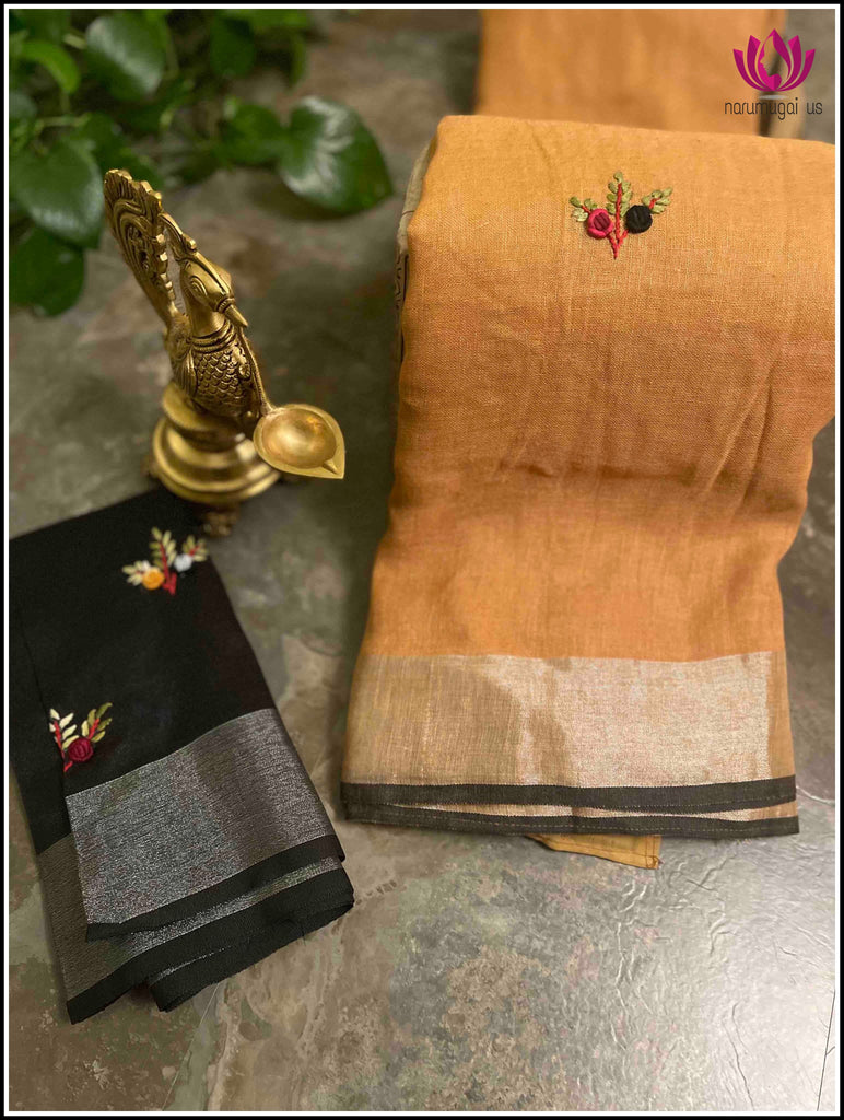 Linen saree in mild Yellow and Black with French knot floral embroidery